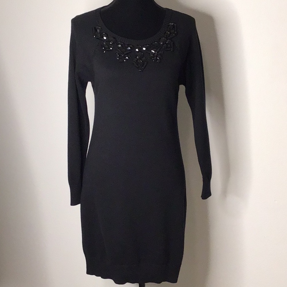Ann Taylor size SP black sweater dress with detailed neckline.
